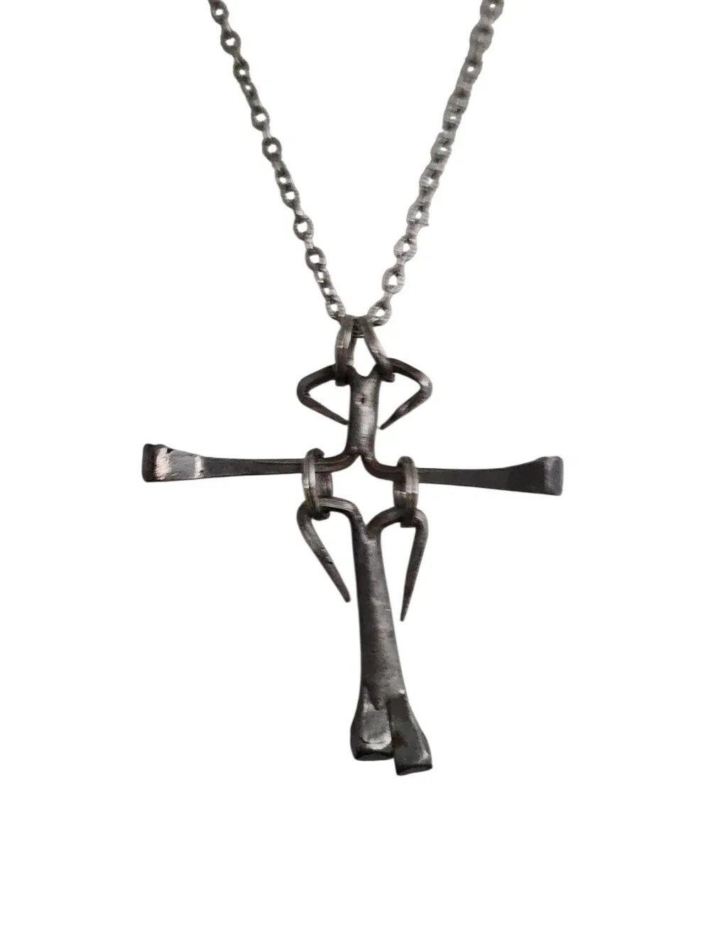 Nail Cross Pendant on a Silvertone Chain